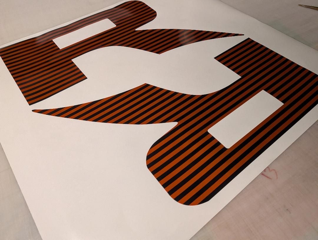 Raptor R Bedside Graphic "R"