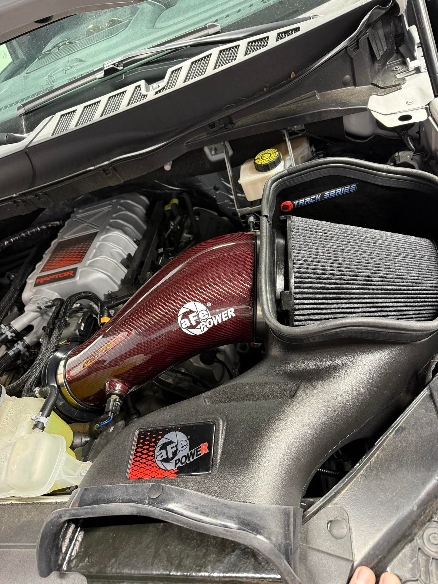 AFE 23-24 Ford F150 Raptor R V8 5.2L Supercharged Red Carbon Track Series Air Intake w/ P5R Filter