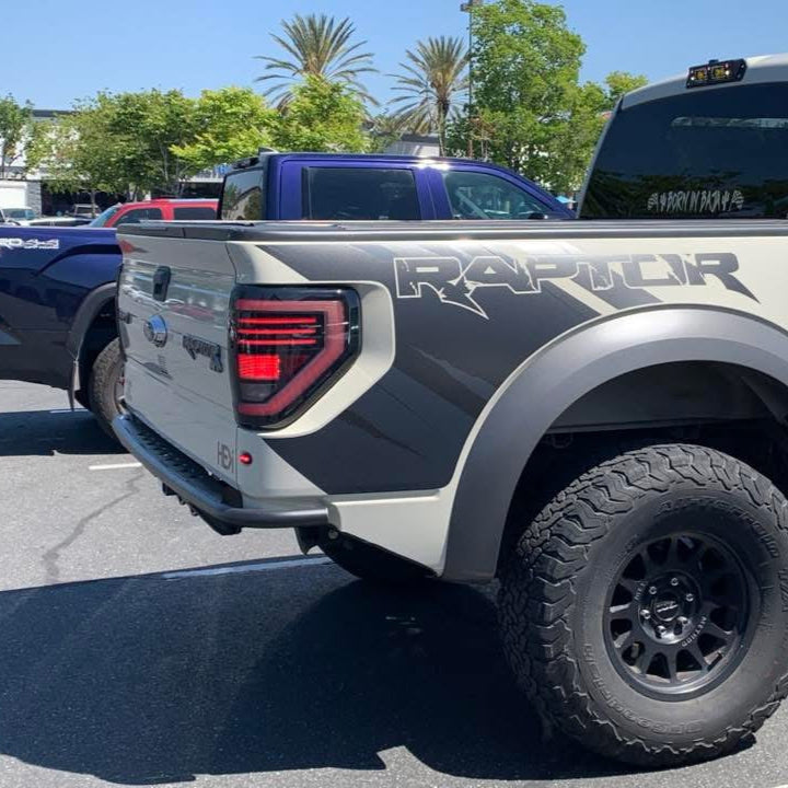 Winjet 2010-2014 Ford Raptor Matte Black /Clear Tail Lights